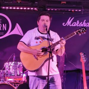 Singer and guitarist But That's My Favourite Mug Steve, playing at The Horn in St Albans.