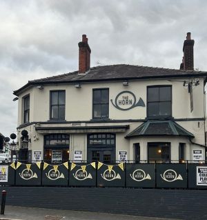 The Horn in St Albans, an independent live music venue, shot from the front in inclement weather.