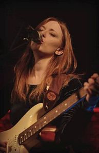 Singer songwriter Orla Gartland performing a gig, notably not the gig mentioned in the text.